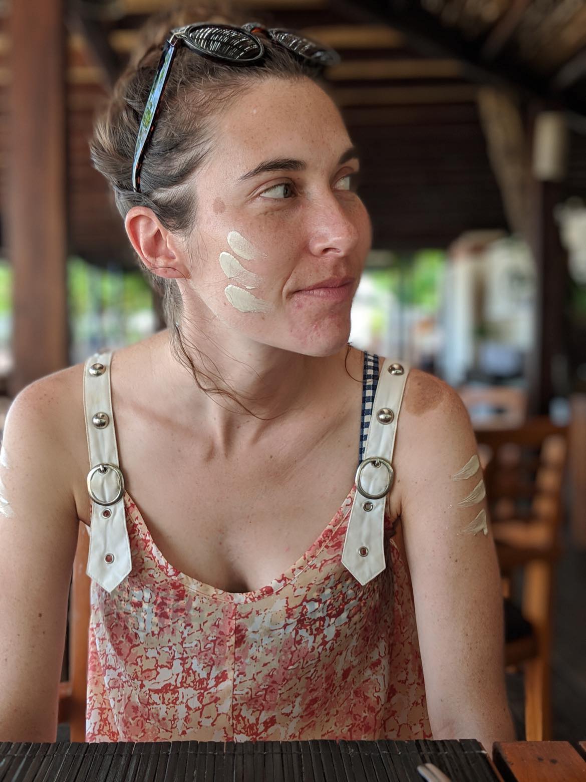 Laura with facial paint from a breakfast ceremony for Songkran in Thailand